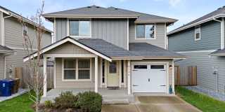 Modern 4-Bed Tacoma Home | Energy Efficient, Fenced Yard & 16 Mins to JBLM! Modern 4-Bed Tacoma Home | Energy Efficient, Fenced Yard & 16 Mins to JBLM! Gallery 1