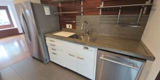 Beautifully designed 2BD/1BA home located near Henderson Center! Gallery 17