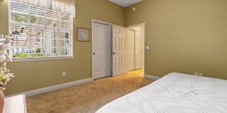 Experience Bell Tower Park. GATED ground floor 2 Bed 2 Bath Den 1 Car Garage Condo. Gallery 14