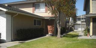 Lovely 2 bedroom Penthouse Condo with garage & pool Gallery 1