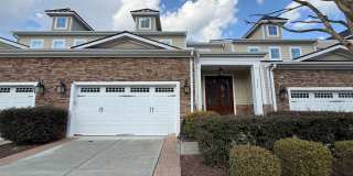 Luxurious 3BD, 4BA Raleigh Townhome with a First Floor Master Bedroom, Bonus Sunroom, and Large Upstairs Loft within the Desirable Wakefield Plantation Community Gallery 1