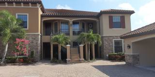 Seasonal/short term turnkey furnished Incredible 2/2 with den ground floor condo in resort Esplanade Lakewood Ranch Gallery 1