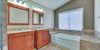 Summerlin!! 5 bedroom home!! W/Bed bath downstairs!! 3 Car Garage!! Synthetic grass in front yard. Back has patio. Summerlin!! 5 bedroom home!! W/Bed bath downstairs!! 3 Car Garage!! Synthetic grass in front yard. Back has patio. Gallery 43