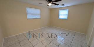 Newly renovated 3/1/1 NEW flooring, NEW paint, updated kitchen & bath, fenced yard.. a MUST SEE!! Gallery 12