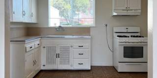 Charming 2 Bedroom, 1 Bathroom Home with Large Fenced Yard + Garage Gallery 19