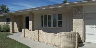 Spacious 3 Bed, 2 Bath Ranch Home with Sunroom and 2-Car Garage Gallery 1