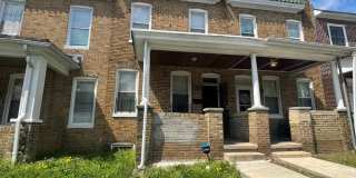 2 Bedroom + Den Home with Porch, Fenced Yard, and Water Included on Barclay Street Gallery 1