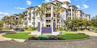 Luxury Living Meets Prime Location! Naples Square 2/2 Condo with Expansive Terrace Gallery 1