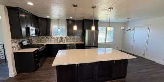 Spacious 4 Bed, 2 Bath Home with Fenced Yard Gallery 1
