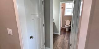 4 Bedroom / 4 bath New Townhome. Every bedroom is its own Master Suite with your own full bathroom, walk in closet and A/C unit. Full-size washer and dryer in your unit. Gallery 20