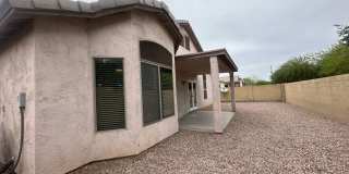Single-level 3-bedroom home in a desirable Chandler location featuring a 2-car garage and tile roof and wood plank flooring throughout Gallery 4