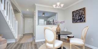Discover this beautifully updated Raintree townhome featuring an open floor plan and a range of contemporary enhancements. Gallery 9