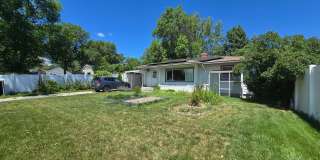 Spacious 4 Bedroom Home with Solar Panels, Fully Fenced Yard on Rimrock Rd Gallery 1