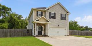 Newer Home On 3 Acres! Landscaping, Electric, Water, & Sewer Included In Price! Pet Friendly - Attached Garage w/Opener - Storage Shed! Gallery 1