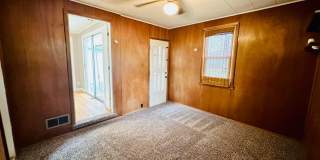 {7047} Prairie Village Ranch with Hardwood Floors + Large, Fenced Yard + 1 Car Garage Gallery 8