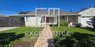 Beautiful 3/2 + Large Bonus Room, Covered RV Parking, Storage Shed, Hardwood Floors, Updated Kitchen Gallery 1