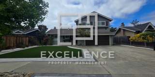 Beautiful 3/2.5 Home With 2 Fireplaces, Updated Kitchen, Spacious Yard and Covered Patio Gallery 1