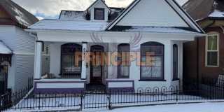 Charming Three-Bedroom Home with Garage and Yard Gallery 1