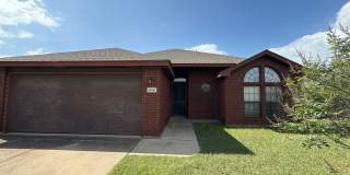 All brick beauty with fireplace and fenced yard! Gallery 1
