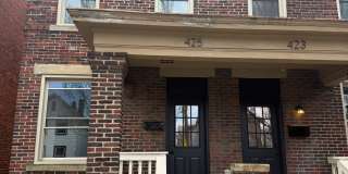 Rare 2-Full Bath Find: Pristine Renovation with Designer En-Suite & Granite Gallery 1