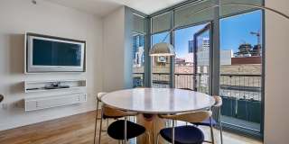 Gorgeous designer one bedroom in Hayes Valley w/lots of light, views, W/D, private patio, roof deck, gym and parking! Gallery 8