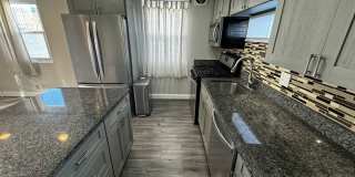 Discover Comfort and Convenience in this Charming 2BR, 1BA Duplex Gallery 8