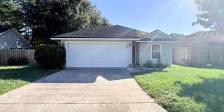 Spacious 3-Bedroom Home with Fireplace, Fenced Yard & Beautiful Water Views! Spacious 3-Bedroom Home with Fireplace, Fenced Yard & Beautiful Water Views! Gallery 1