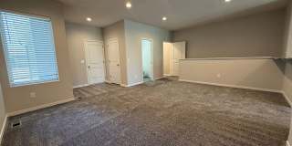 Ranch townhome with 2 stall garage. Spacious 2 bedrooms with walk in closets, 2.5 bathroom, 1st floor laundry Gallery 11