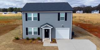 Brand new 4-bedroom / 3 Bath with a main-level guest suite in the sought after Barbour Farms community! Gallery 1
