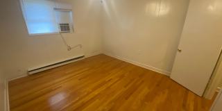 Private carport, in-unit laundry, and the Lakewood strip right outside your door. Gallery 11
