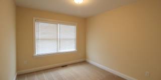 Spacious 3 Bedroom, 3.5 Bathroom Townhome with Finished Basement, Fenced Yard & Garage Gallery 22