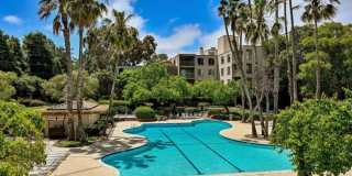 Elegant, private end-unit living with resort-style amenities! Gallery 1