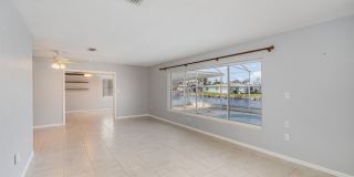 Beautiful canal front home with dock! Gallery 6