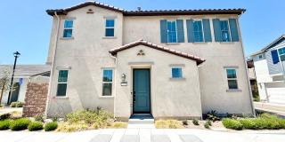 Turnkey Riverwalk Village 4 Bedroom Home with INCLUDED Solar, Upgrades & Prime Location Gallery 1