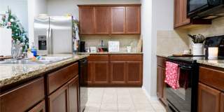 2 car garage with lighting, granite countertops. Backyard includes a custom extended concrete patio perfect for gatherings Gallery 17