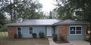 COZY 4/2 NW House w/ Hard Floors, Office/Playroom, & Huge Yard Avail June 1st for $1695/month! Gallery 1