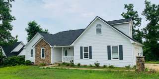 Great location, private/wooded lot, large deck, 4th bedroom up w/attic storage, 2 car garage, fully renovated, must see! Gallery 1