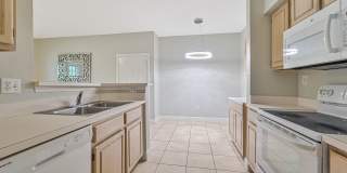 FIRST FLOOR CONDO ~ Walking Distance to Coconut Mall Gallery 13