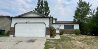 4 Bed, 2 Bath Loveland, CO Home- Fenced Backyard, A/C, & 2 Car Garage! Gallery 1
