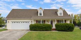 3-Bedroom Home with Main-Level Primary Suite, Sunroom & 2-Car Garage 3-Bedroom Home with Main-Level Primary Suite, Sunroom & 2-Car Garage Gallery 1