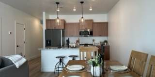 Row Home with 1 car garage 2 bed, 2.5 bath Gallery 1
