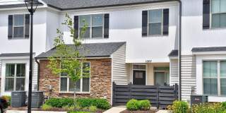Brick  Bright Living in Villages at Bartlett Station | 3BD, 3BA Townhouse Gallery 1