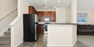 Relax & Unwind in this Spacious End-Unit Townhome Gallery 10