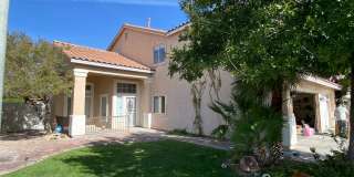 AMERICANA Property Mgmt - Stunning 5 beds-2 story house with pool & spa in Green Valley Ranch Gallery 1