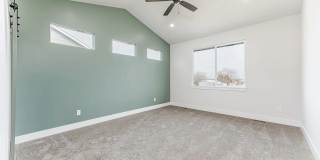 Single family home in Goddard Kansas. This home features 2 bedrooms, 2 bathrooms and a three car garage. Gallery 14