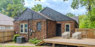 Completely remodeled like new Gingerbread midtown cottage with gleaming hardwoods, converted from a 3/1 to a 3/2. Gallery 41