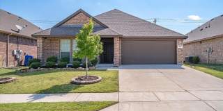 Walk to Royse City High and Buc-ee’s—this gorgeous home features an open layout, massive quartz kitchen, oversized suite, and a covered patio with a fully fenced backyard! Gallery 1