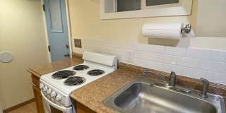 Charming 1928 Row Home for Rent with Modern Amenities — 3 Bedroom 2 Full Bath w/ 2 Half Baths, 2 Kitchens, located in Kingman Park, Near DC Armory & Eastern Market Gallery 58