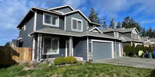 Spacious Pet Friendly 4 Bedroom Home Close to Everything! Gallery 1