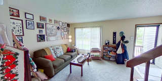 2 BR, 1.5 BA Clive split level duplex.  Deck and one car attached garage. Gallery 2